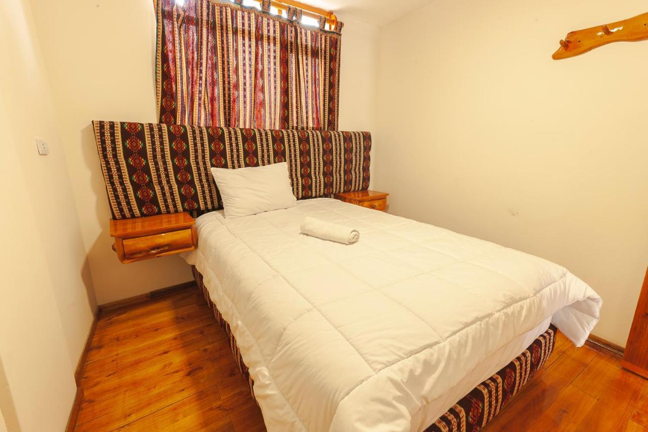 Los Ponchos Inn Apartasuite Отавало Экстерьер фото
