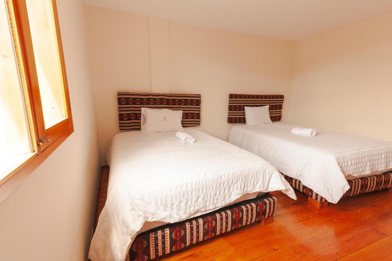Los Ponchos Inn Apartasuite Отавало Экстерьер фото