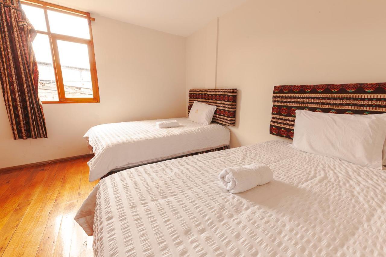 Los Ponchos Inn Apartasuite Отавало Экстерьер фото