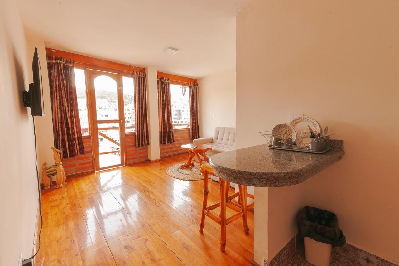 Los Ponchos Inn Apartasuite Отавало Экстерьер фото